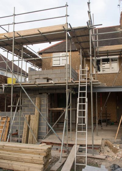 Rear extension going up in blockwork under scaffolding