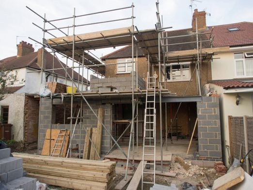 Rear extension going up in blockwork under scaffolding